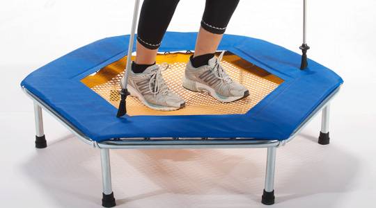 Two feet on the Eurotramp fitness trampoline "Trimm Tramp"